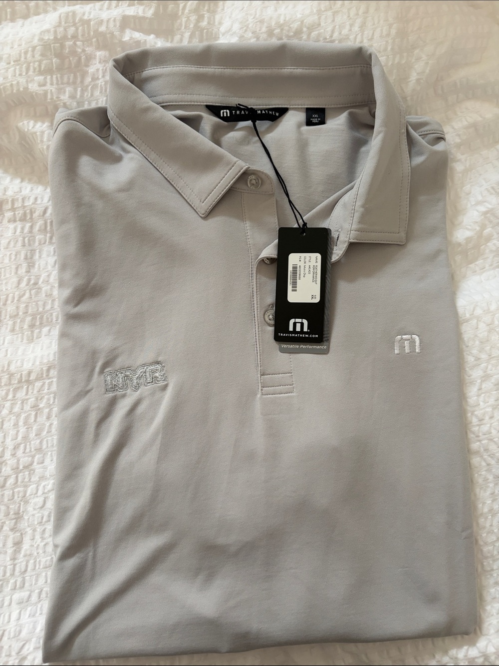Travis Mathew Light Gray Performance Polo with Subtle Embroidery